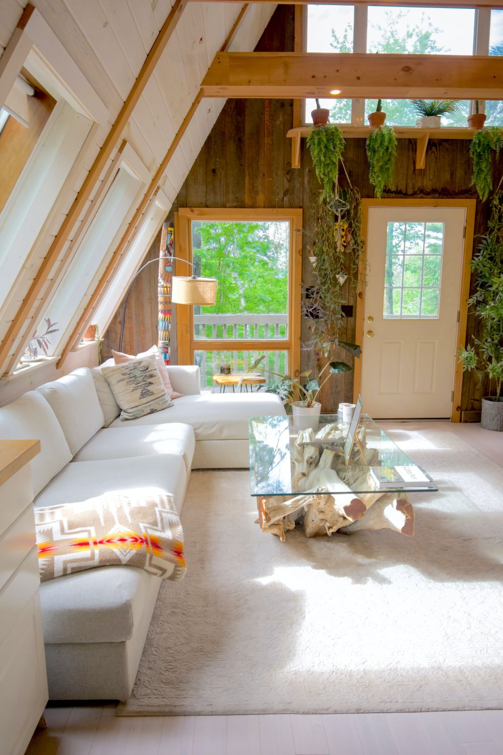 Bright family living room with large windows and a corner sofa